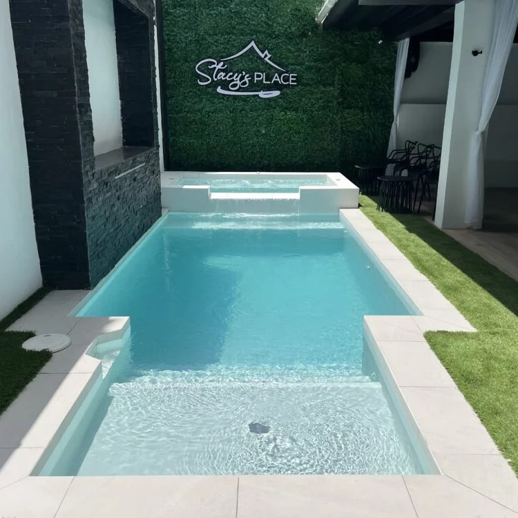 Shared outdoor pool at Stacy's Place