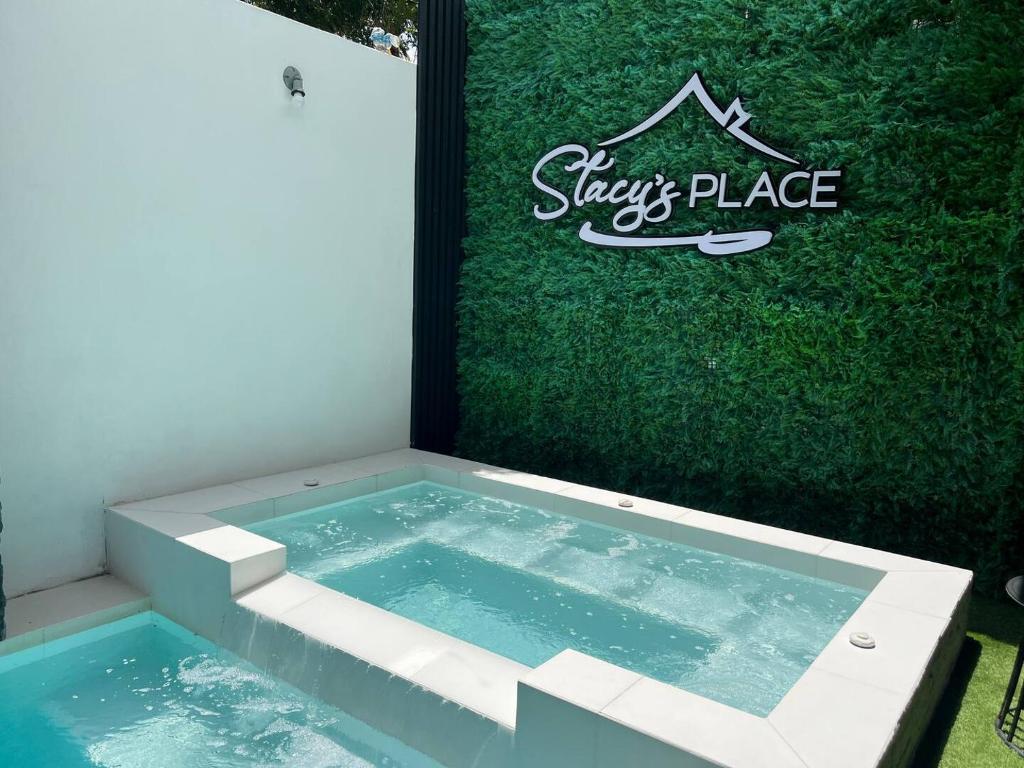 Shared pool leisure area and raised spa water feature